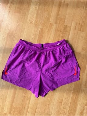Nike Aeroswift Women's Bright Purple Athletic Shorts with Orange Swoosh